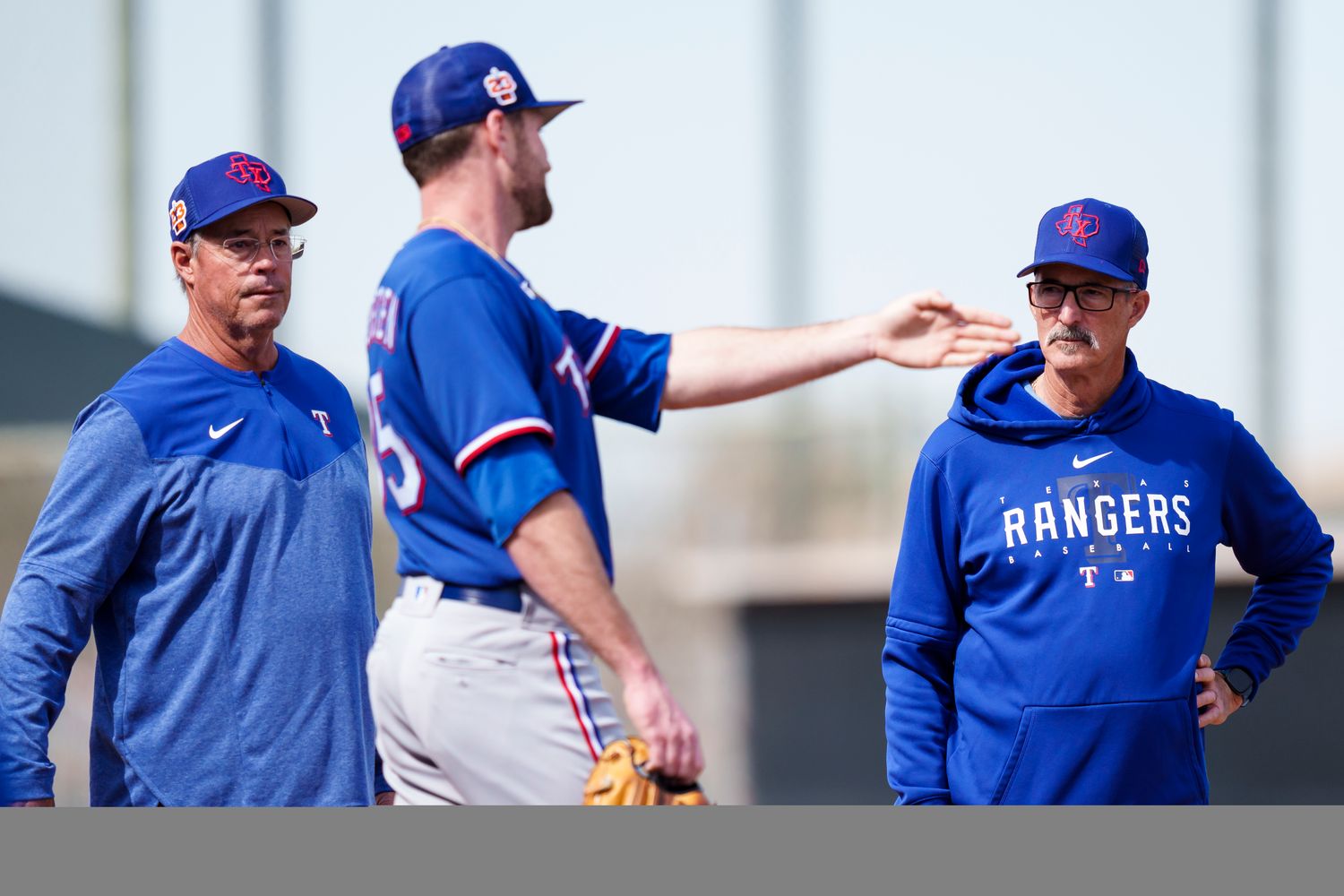 Hall of Famer Greg Maddux, left, with his brother, Texas Rangers pitching coach Mike Maddux, right, has been invited by manager Bruce Bochy to visit spring training to help instruct pitchers. Greg Maddux has often helped instruct pitchers during spring training while his brother has been a Rangers coach.